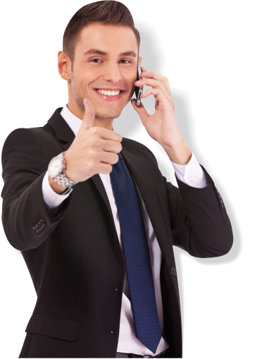 man in suit showing thumbs up